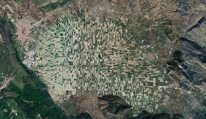 High-Resolution Aerial View of Agricultural Patterns and Land Impact