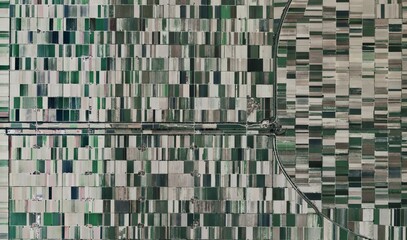 High-Resolution Aerial View of Agricultural Patterns and Land Impact