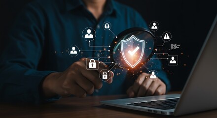 Businessman using a magnifying glass to examine data security and digital protection.