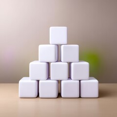 Obraz premium Pyramid of White Cubes on Light Wood Surface