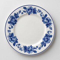 Blue floral plate, ceramic dish, white background, decorative border, elegant design