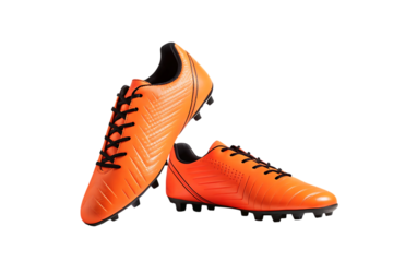 Orange soccer cleats isolated on transparent background