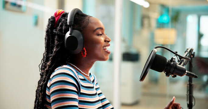Studio, black woman and speaker with microphone for broadcast, audio recording and talk show. Office, female presenter and podcaster with communication for announcement, news media and headphones