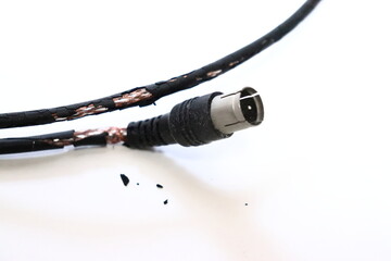 Photo of dusty, deteriorated TV cables.