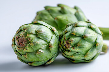 Obraz premium Close up, Roman artichokes on white studio setting