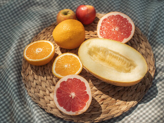 Fresh Assorted Fruits on Wicker Platter for Outdoor Picnic