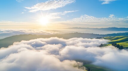 Sunrise above rolling hills, sea of clouds