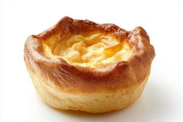 Perfectly baked Yorkshire pudding showcasing a fluffy texture, golden brown exterior, and light interior ideal for traditional British meals