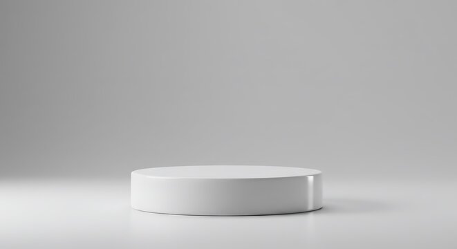 Simple white cylindrical product display platform on a light gray background