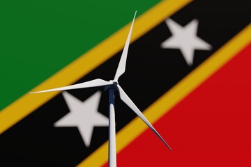 Wind turbine on a background of blurred flag of Saint Kitts and Nevis. Wind power concept, selective focus