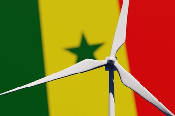Wind turbine on a background of blurred flag of Senegal. Wind power concept, selective focus