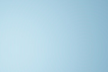 Denim blue background with concentric circles from center. Light is coming from bottom left