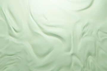 Green thumb luxury texture imitating silk with folds and glitter. Light is coming from top