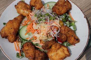 a mixed salad with chicken