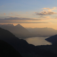 Golden evening sky over Lake Thun and Mt Niesen, Switzerland.