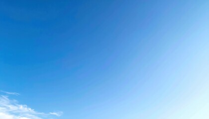 Fototapeta premium Clear blue sky over a serene landscape nature photography tranquil atmosphere wide-angle view