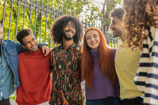Group of students embracing friendship and diversity on campus