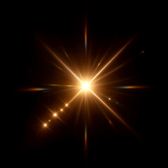 Bright golden starburst with radiating light beams on black background.