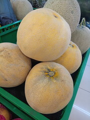 Fresh melon or cantaloupe in the market. Melon or cantaloupe is sweet fruit dessert.