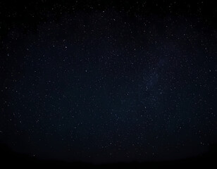 Fototapeta premium A magical night sky with glowing stars and a crescent moon, ample copy space, starry night sky