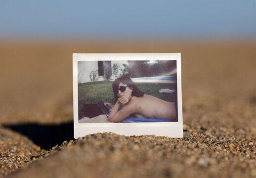 Standalone Polaroid on Sandy Beach at Sunset