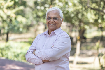 Happy senior man at park