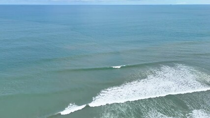 Bengkulu, Indonesia - April 17, 2025: Aerial view drone shot of beautiful tropical Pasir Putih Beach