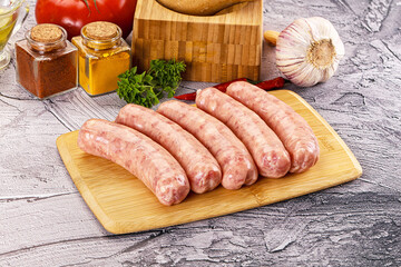 Raw meat sausages for grill