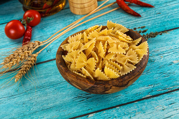 Raw dry farfalle for cooking