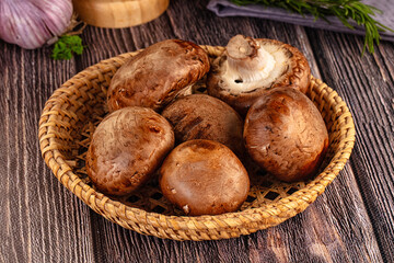 Raw brown champignon heap for cooking