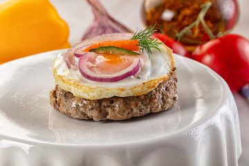 Beefsteak chop with roasted egg
