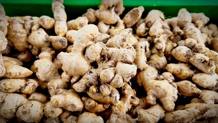 piles of ginger on display ready for sale