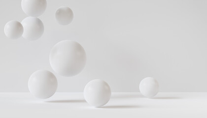 Falling white 3d rendering spheres on white room. Abstract geometric minimal background.