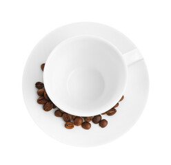 Ceramic cup with roasted coffee beans isolated on white, top view