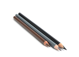 Three different eyebrow pencils isolated on white