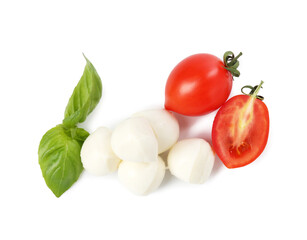 Tasty mozzarella cheese balls, tomatoes and basil on white background, top view