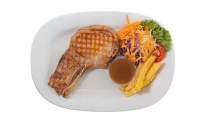 Grilled Pork Chop with Salad, Fries, and Gravy Sauce on White Plate