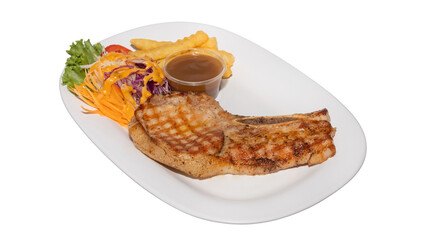 Grilled Pork Chop with Salad, Fries, and Gravy Sauce on White Plate