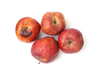 Rotten apples isolated on white, top view