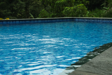 Outdoor swimming pool with clear water, closeup