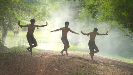 A farmer and a rice worship ritual with a group of traditional dancers
