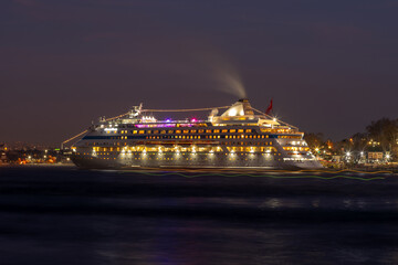 Large cruise ship on the Bosphorus Strait at night
