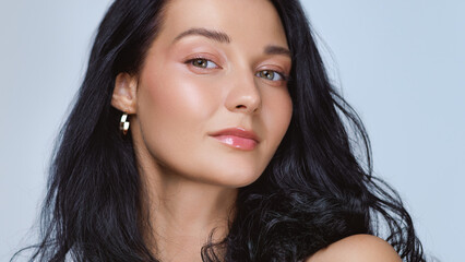 Closeup Portrait Of Confident Woman With Black Hair And Radiant Skin