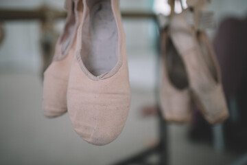 Ballet shoes on ballet barre