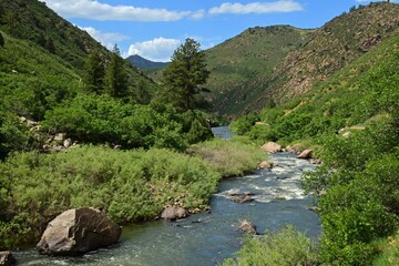 south  platte river rapids, boulders, and  scenic foothills on a sunny summer  day in waterton canyon, littleton, colorado   