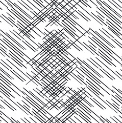 Texture in the form of diagonal straight stripes and needles. Some of the lines intersect.