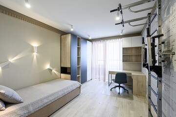 modern bedroom with a bed, desk, wardrobe, and exercise equipment. The color palette is neutral with pops of blue