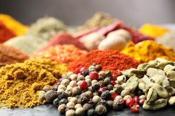 Many different spices on table, closeup view