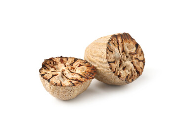 Halves of fresh nutmeg isolated on white