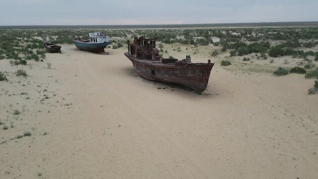 Shipwrecks decaying on former seabed near town of Muynak